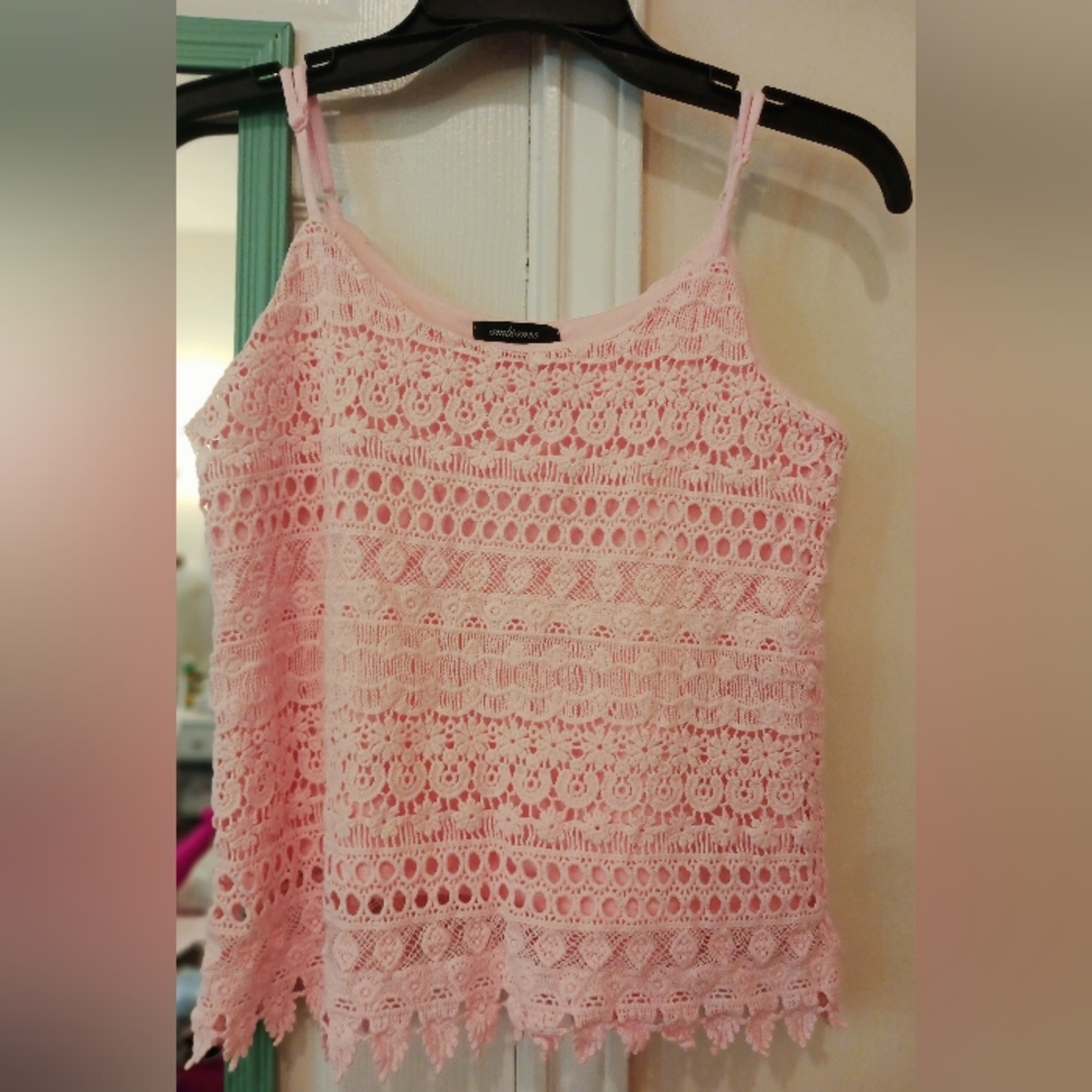 A beautiful baby pink tank top good for summer vacation or regular wear